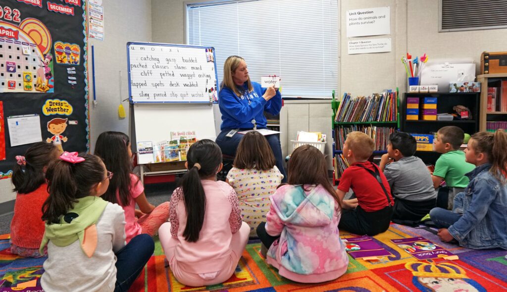 Teacher interacting with students