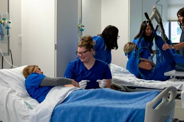 Nursing students practicing clinical skills