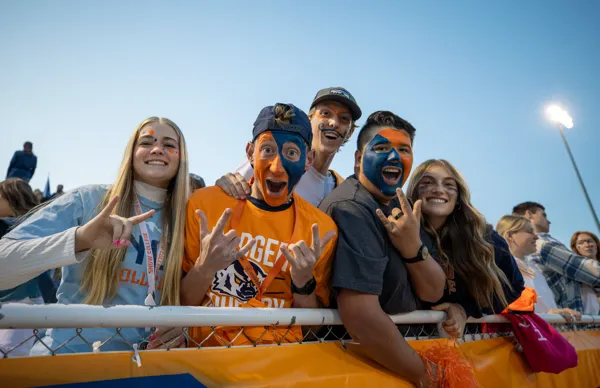 Students cheering at homecoming