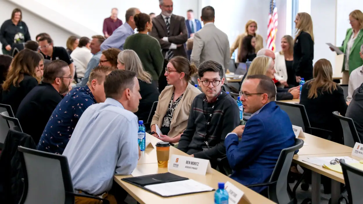 College executives, faculty, and staff meet at Mountainland Technical College
