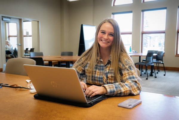 Girl figuring out her new student email